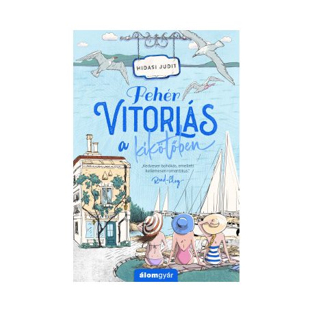 Fehér vitorlás a kikötőben